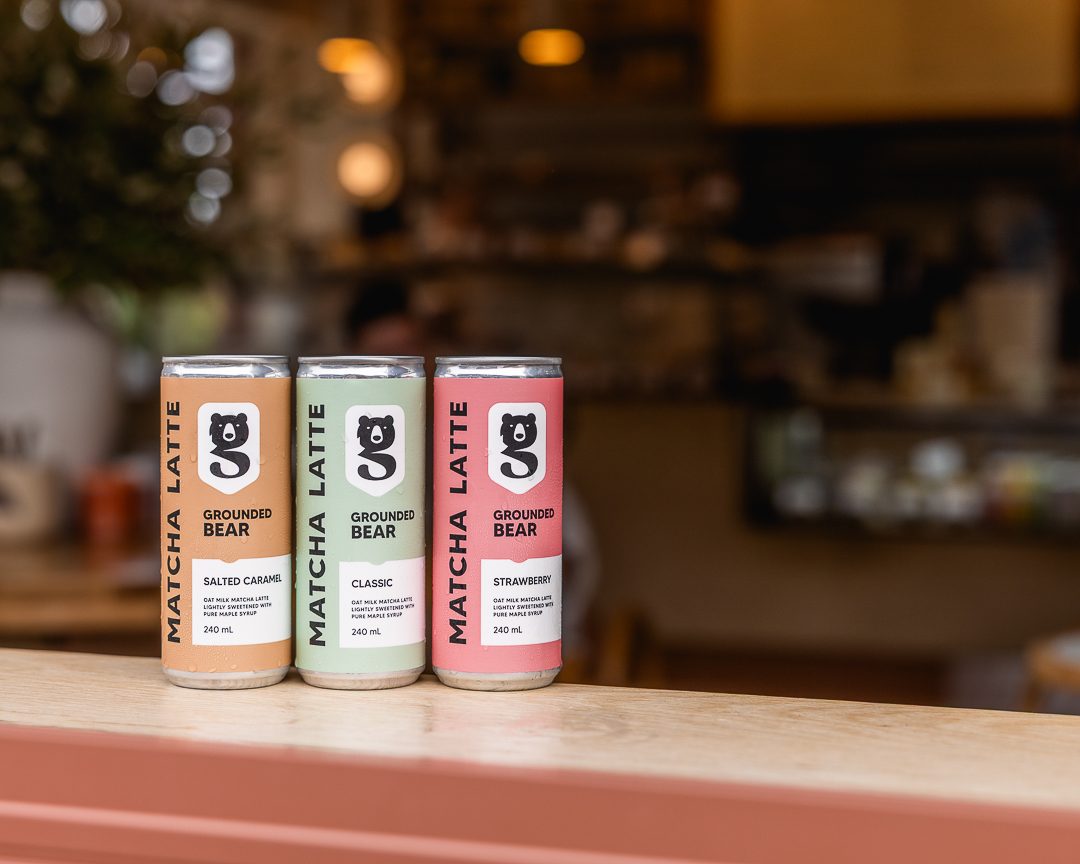 Pouring shots of Grounded Bear matcha lattes